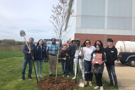 An image taken by the Environmental Club at their most recent tree planting on the Ammerman Campus.