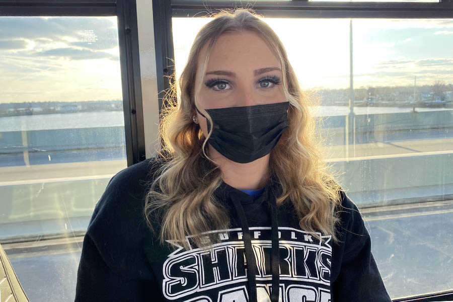 Lindsey Pasin, 20, of Sayville sits on the bus to Monroe College for a basketball game on Feb. 26, 2022. Pasin is an interior design major on the Eastern Campus at Suffolk