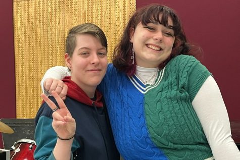 Levi Schmidt, 19, a vocal music major and Sage Porter, 18, a music major share an embrace after performing at the Informal Recital on Feb. 15, in room 20 of the Southampton building. (Compass News/Elisha Feliz)
