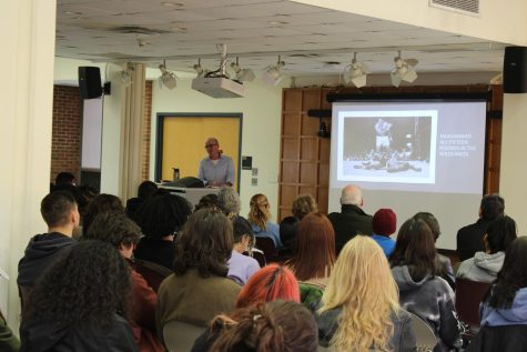 Professor David Hannigan giving the lecture on Feb. 27, 2023 in the Babylon Student Center. (Layne Groom/Compass News)