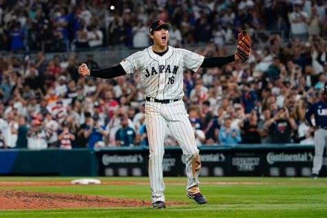Japanese pitcher Shohei Ohtani is jubilantly celebrating stringing out Angels teammate Mike Trout, to secure Japans first World Baseball Classic title since 2009. March 21, 2023, Miami FL.