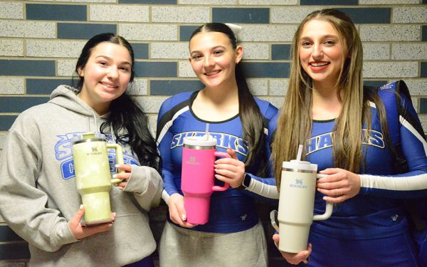 Giana Lacasse, Giana Solaro and Payton Rhodes hold their Stanley Quenchers on Feb. 1, 2024.  The tumblers are popular among Suffolk students. (Compass News/Jay Kass)