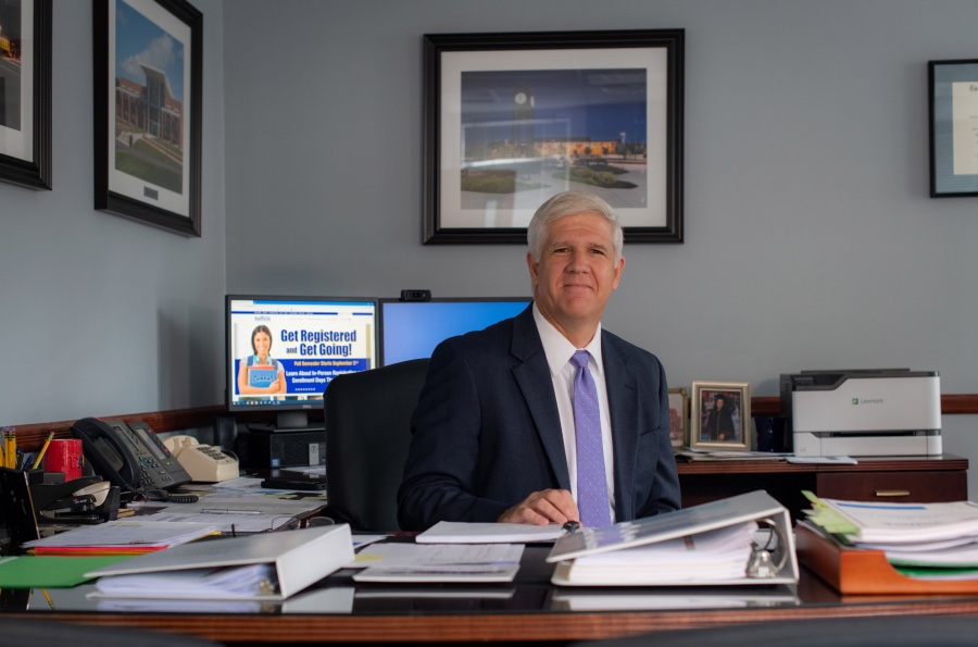 Edward Bonahue, president of Suffolk County Community College, in his Norman F. Lechtrecker Building office. (Compass News/Sajad Syed)