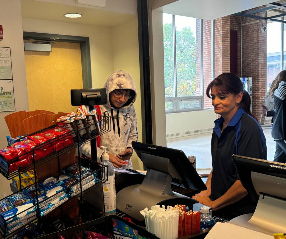 Mrs. Nancy feeding her students. 