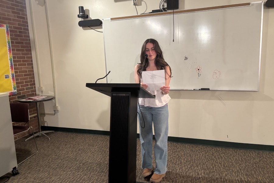 Amanda Albrecht, 19, a general studies major from Patchogue, performs at the Society of Writers' Open Mic Night on April 10.