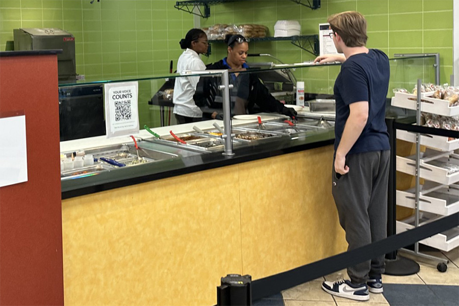  Babylon Student Center criteria staff serve up a Barbecue District option on Oct. 2, 2025. (Compass News Staff Photo)